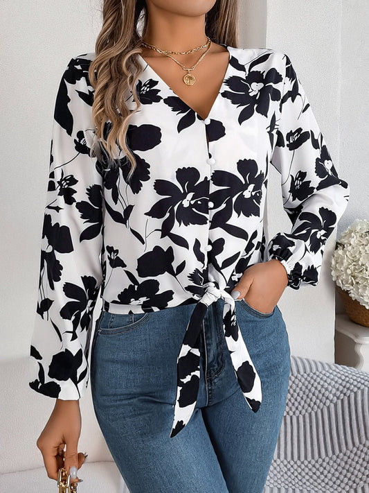 Victoria - Elegante blusa estampada con cuello de pico y manga larga